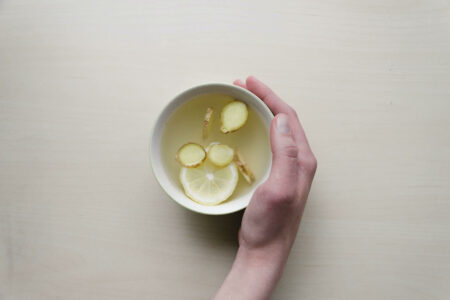 Cup of tea with lemon and ginger, representing a healthy lifestyle