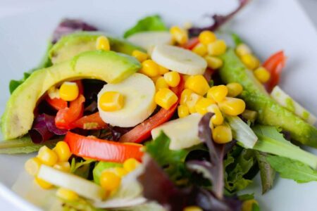 Close-up shot of a vibrant vegetable salad, representing a balanced diet for promoting healthy blood vessels