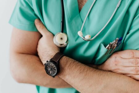 A doctor with a stethoscope debunking health myths